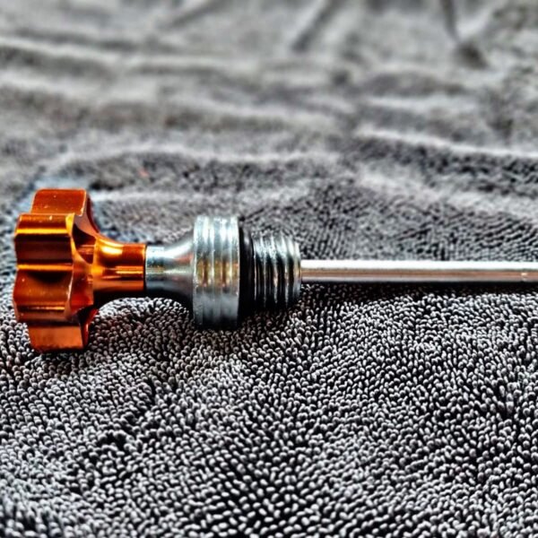 TAPON MEDIDOR DE ACEITE LARGO NARANJA