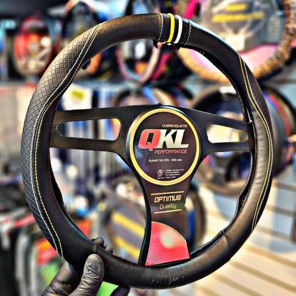 CUBRE VOLANTE QKL NEGRO TIRA BLANCO/AMARILLO